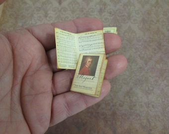 Mozart's Harmony: Select from 4 Dollhouse Sheet Music Folders. Infuse your miniature world with the timeless allure of Mozart compositions.