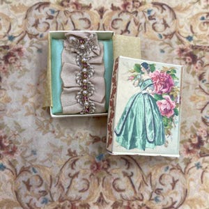 Dollhouse Miniature lady victorian blouse in its box. 1:12 Dollhouse Miniature home & doll complements items for dollhouse collectors.