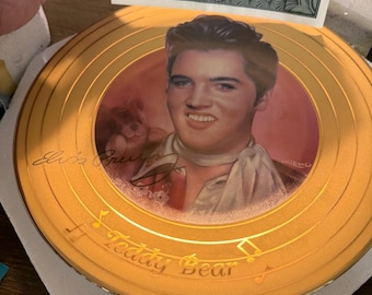 collectible porcelain plate featuring Elvis Presley, produced by the Bradford Exchange in 1997 as the second issue in the "Solid Gold Elvis"