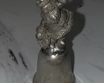 vintage Christmas bell featuring Santa Claus