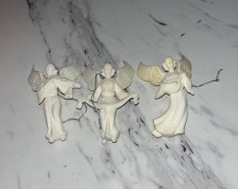 Plastic winged angels about 4inches tall