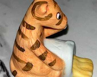 Tigger with a pot of honey