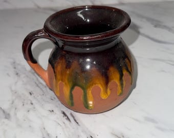 Mexican folk art pottery mug, also known as a "jarrito".