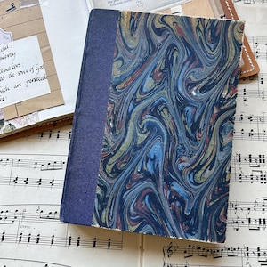 French vintage book. 1920s antique French novel. Blue marbled cover. Vintage books. Ephemera. French vintage. Handwriting. Display