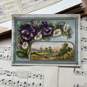 Karte Antikes violettes Stiefmütterchen. Vintage Junk Journal Ephemera. Frohe Weihnachtskarte. Szene, Gedicht, hübsch, 1900, floral, viktorianischer Schrott, antik