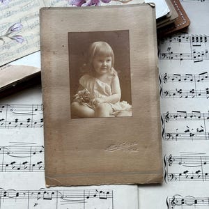 Antique photo of a child. Baby. Edwardian dress. Victorian photograph. Old picture. Carte de Visite. Junk journal. Portrait. Cute, flowers
