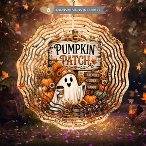 May include: A circular metal wind spinner featuring a ghost wearing an orange knit hat and holding a coffee cup. The design includes a wooden sign reading PUMPKIN PATCH, smaller signs for HAY RIDES, CIDER, and CANDY, plus pumpkins and sunflowers.