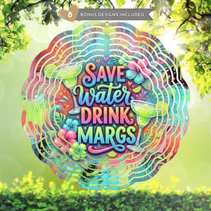 May include: A colorful, round metal art piece with the text "Save Water Drink Margs" in a whimsical font. The design features margarita glasses, flowers, and a layered, wavy edge. The color palette includes vibrant blues, greens, pinks, and oranges.
