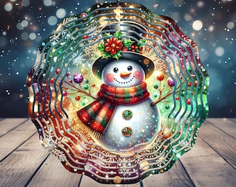 Könnte beinhalten: Ein dekorativer Metall-Windspinner mit einem Schneemann-Design. Der Schneemann hat einen schwarzen Hut, einen rot-grünen Schal und eine Karottennase. Der Spinner hat ein festliches Winterthema mit dem Text "FREE SPINNER DESIGNS INCLUDED".