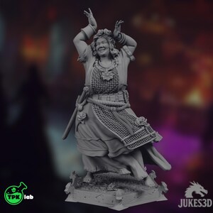 May include: A gray 3D-printed figurine of a woman in a dynamic pose, arms raised. She wears a detailed outfit with floral accents, a sword, and a woven chest piece. The base is textured, and the figure has a joyful expression.