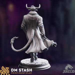 May include: A gray figurine of a minotaur-like character, viewed from the back, wearing a long coat. The figure has horns, a tail, and is standing on a circular base. The text "DM STASH PRINT.PAINT.PLAY" is visible at the bottom.
