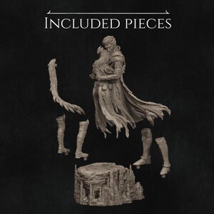 Image showing the full set of parts included in the kit: legs, arms, scenic base, and main body locked in embrace.