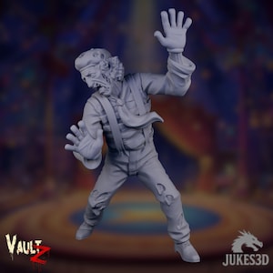 Puede incluir: Figura gris impresa en 3D de una figura angustiada con boina, tirantes y pantalones rasgados, con los brazos levantados en postura defensiva. La figura tiene una expresión de mueca. Los logotipos de Vault Z y Jukes3D son visibles.