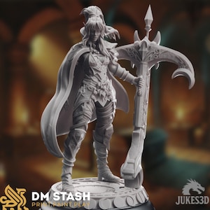 May include: A detailed, gray 3D-printed figurine of a female fantasy character, holding a large crossbow. The figure is wearing armor and a cape. The base of the figurine has the text "DM STASH PRINT. PAINT. PLAY."
