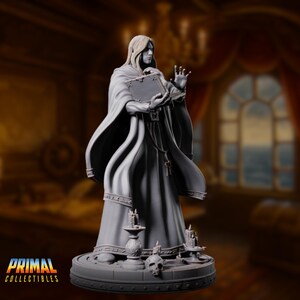 Side view of the elven wizard miniature reveals flowing robes with layered textures and a sweeping mane of hair. His open book appears etched with magical runes, and the pose evokes power restrained by precision.