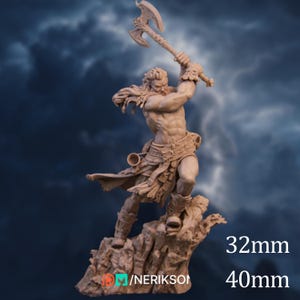 May include: A detailed figurine of a muscular warrior raising an axe overhead. The figure is sculpted in a dynamic pose, standing on a rocky base. The figurine is a light brown color. The text "32mm" and "40mm" is visible.