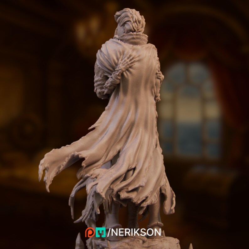 Rear view of the full sculpt on its dramatic rocky base, highlighting movement in the cloak and grounded stance.