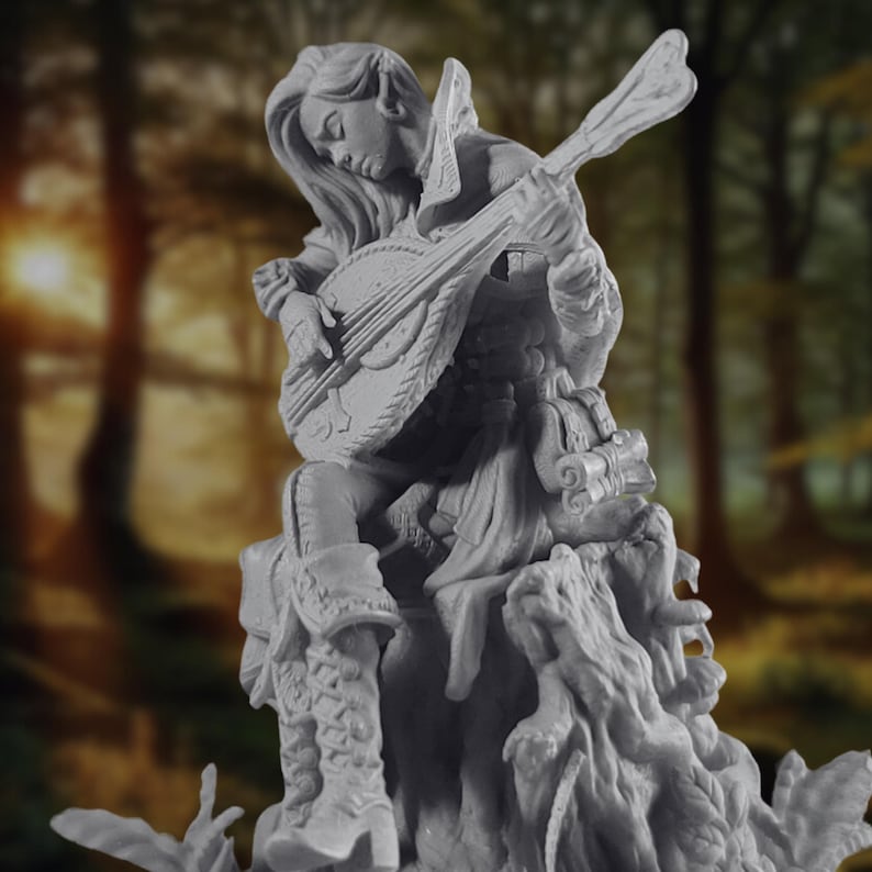 Angled view of Elven Bard Miniature. This bard is immersed in her music, with scrolls, pouches, and instrument details. Ideal for Dungeons and Dragons bard classes or collectors of finely sculpted fantasy figures.