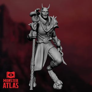 May include: A gray 3D printed miniature of a demon with horns, a snake staff, and cloven hooves. The demon is wearing a robe and has a beard.