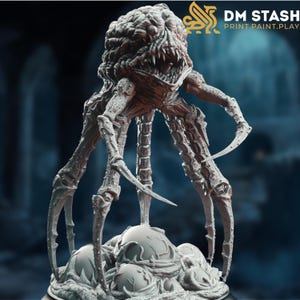 May include: A detailed, gray, monster figurine with a textured, brain-like head, sharp teeth, and multiple spindly legs ending in curved claws. The base features several rounded shapes. The text "DM STASH PRINT.PAINT.PLAY" is visible in the upper right corner.