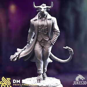 May include: A detailed, gray figurine of a minotaur in a suit and long coat, holding a staff. The minotaur has horns and a tail. The base of the figurine has the text "DM PRINT.PAINT.PLAY" and the Jukes3D logo.