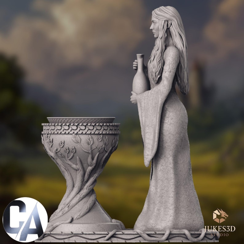 Side profile view of the elven priestess miniature showing the full silhouette. Pointed ear detail visible. Long textured robe with botanical patterning cascades to the base. The ewer is held at chest height. The tree-root pedestal tapers elegantly from base to bowl. Serpent coil detail visible at ground level.