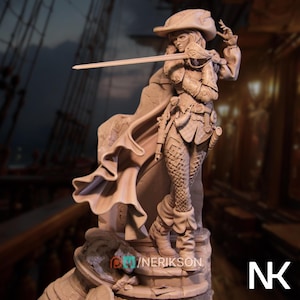 May include: A detailed sculpture of a female figure in a pirate-like outfit, holding a sword. The figure wears a hat, cape, and armor, with intricate detailing on the clothing and accessories. The sculpture is set against a blurred background of a ship.