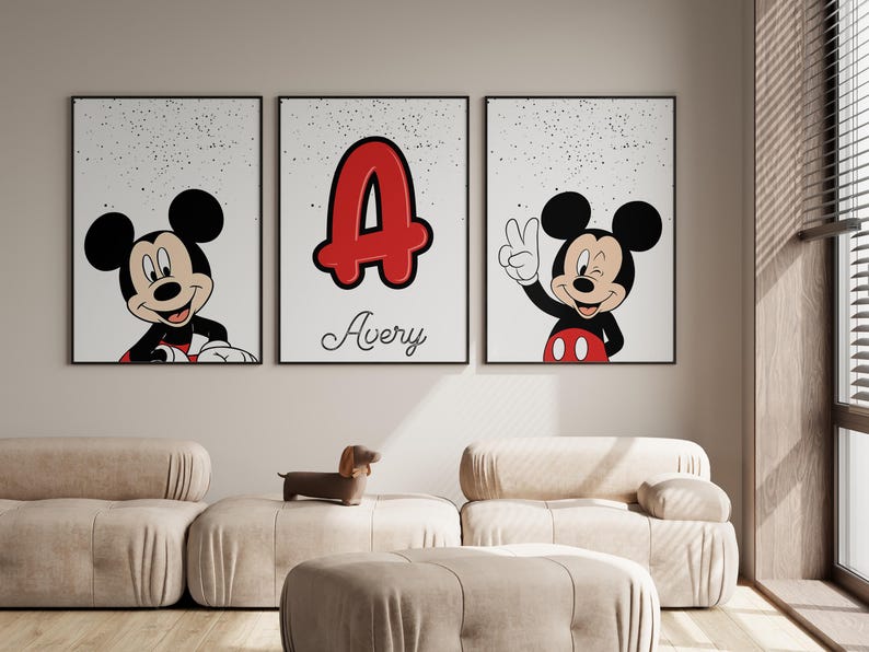May include: Three framed prints featuring Mickey Mouse and a personalized design. One print shows Mickey Mouse smiling, another displays a red letter "A" with the name "Avery", and the third shows Mickey Mouse giving a peace sign.