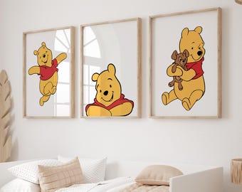 May include: Three framed prints featuring Winnie the Pooh, a beloved cartoon bear. The prints show Winnie the Pooh in different poses, including one with his friend Piglet. The prints are perfect for a child's room or nursery.
