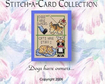 May include: A cross-stitch pattern card with a light brown background. The card features two scenes. The top scene shows a dog on a leash with the text "Dogs have owners". The bottom scene shows a cat sleeping with the text "Cats have staff!" The card has a blue border and the text "Stitch-A-Card Collection" at the top. The text "Dogs have owners..." is at the bottom of the card with the text "Copyright 2006" below it.