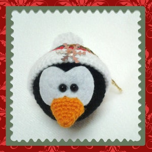 Crocheted Penguin Tree Ornament Pattern by Crafty Threads