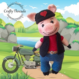 May include: A crocheted pig wearing a black hat with a red heart, a black vest, a red shirt, and blue jeans. The pig is standing next to a green motorcycle.