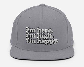 i'm here. i'm high. i'm happy. -- Embroidered Snapback Hat