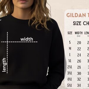 May include: Black sweatshirt with a size chart from Gildan 18000. The chart shows measurements for width, length, and sleeve length in inches, ranging from size small to 5XL. The sweatshirt is shown on a person.