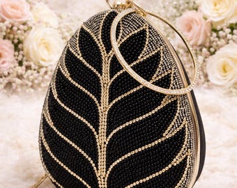 Schwarz & Gold verzierte Box-Clutch, Abendtasche aus dem Handgelenk