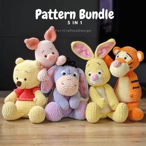 May include: A collection of five crocheted plush toys, including a yellow bear, a pink pig, a blue donkey, a yellow rabbit, and an orange tiger. The toys are arranged on a wooden surface. The text "Pattern Bundle 5 in 1" is at the top.