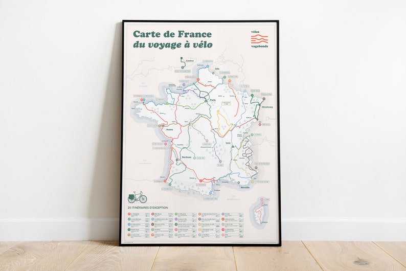 May include: A black and white map of France with colourful lines representing cycling routes. The map is titled "Carte de France du voyage &agrave; v&eacute;lo" and includes a list of 25 itineraries.