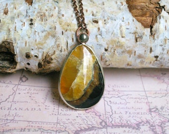 Simbircite and Pyrite in Copper Phoenix Egg Necklace