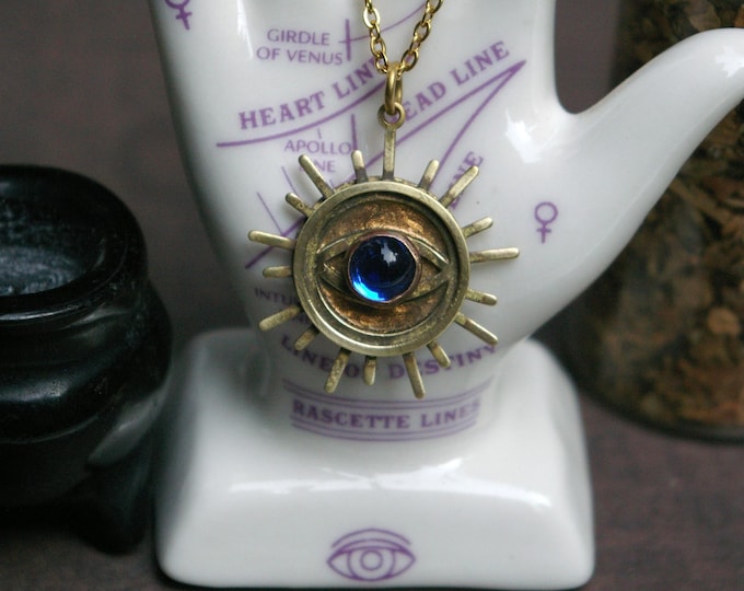 Brass and Glass Eye Pendant, Featured in "A Charmed Woman" Short Story
