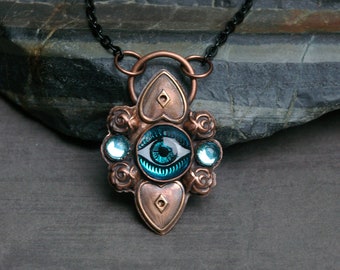 Eye Talisman, Vintage Blue Glass Gems, Recycled Copper Sheet, Die-struck Charm Accents, Black Steel Chain