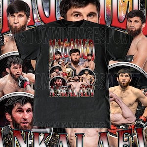 May include: Black t-shirt with a graphic print of a mixed martial arts fighter with the text "Magomed Ankalaev" on the front.