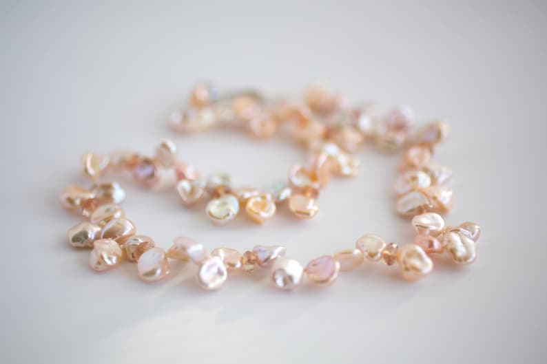 freshwater keshi pearls Peach pink ivory keshi pearl necklace with sunstones June birthstone jewelry
