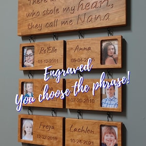 May include: A wooden wall plaque with the text "There are these KIDS who stole my heart, they call me Nana" engraved on it. The plaque has five picture frames attached to it, each with a photo of a child and their name and birthdate engraved below the photo.