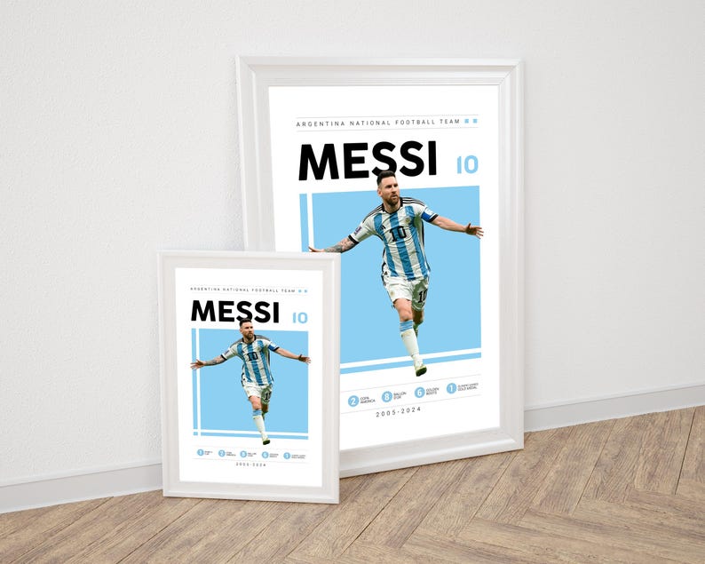 May include: Two framed posters featuring a soccer player in a blue and white jersey with the text "MESSI 10" and "ARGENTINA NATIONAL FOOTBALL TEAM" on a white background.