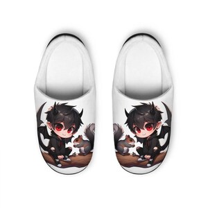 May include: A pair of white slipper shoes featuring a cartoon image of a boy with black hair and red eyes, wearing a black shirt and black wings. The boy is sitting on a branch with two grey squirrels.