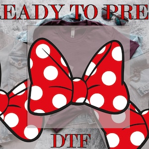 May include: Three red bow designs with white polka dots. The bows are on a light gray background with the text "READY TO PRESS DTF" in red.