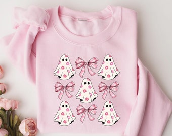 Bonita sudadera con fantasma femenino que sopla burbujas, camisetas de fantasma con lazo rosa coquetas, camiseta con gráfico de fantasma, camiseta de Halloween femenina, camiseta rosa con vibraciones espeluznantes