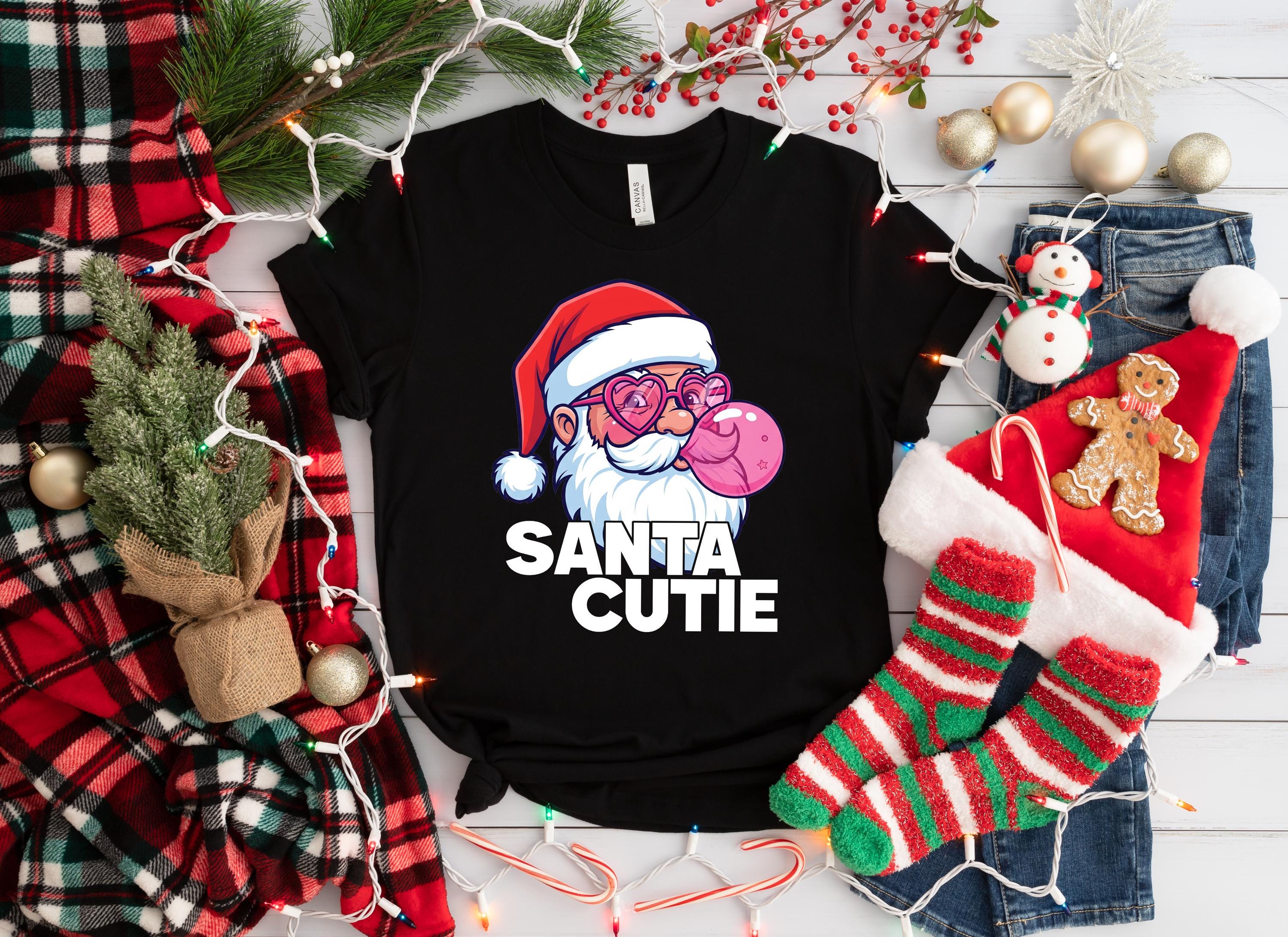キュートなサンタのバブルガムデザインのクリスマスTシャツ。男女兼用