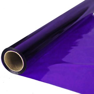 May include: A roll of shiny purple wrapping paper.