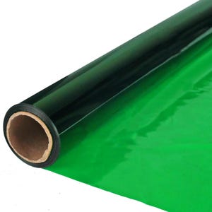 May include: A roll of green and black chroma key paper. The paper is rolled up and has a cardboard core.